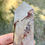 Thumbnail: Hematite in Quartz tower 4 inches at metaphysical crystal shop Canada