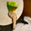 Thumbnail: Amazon parrot feather fan with maple handle at Metaphysical crystal shop