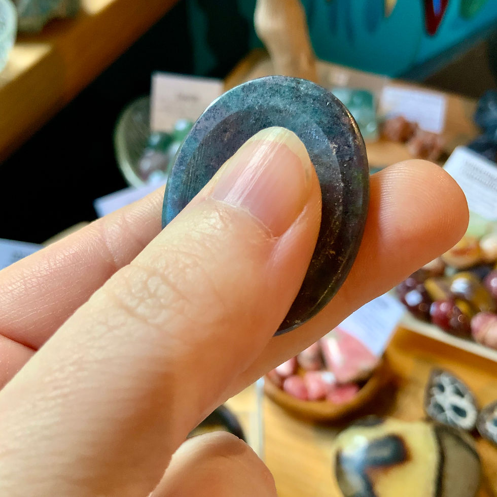 Thumbnail: ruby in kyanite worry stone at metaphysical crystal shop Canada