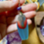 macaw parrot feather earring with amethyst at metaphysical crystal shop