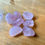 Thumbnail: tumbled rose quartz crystals at metaphysical crystal shop