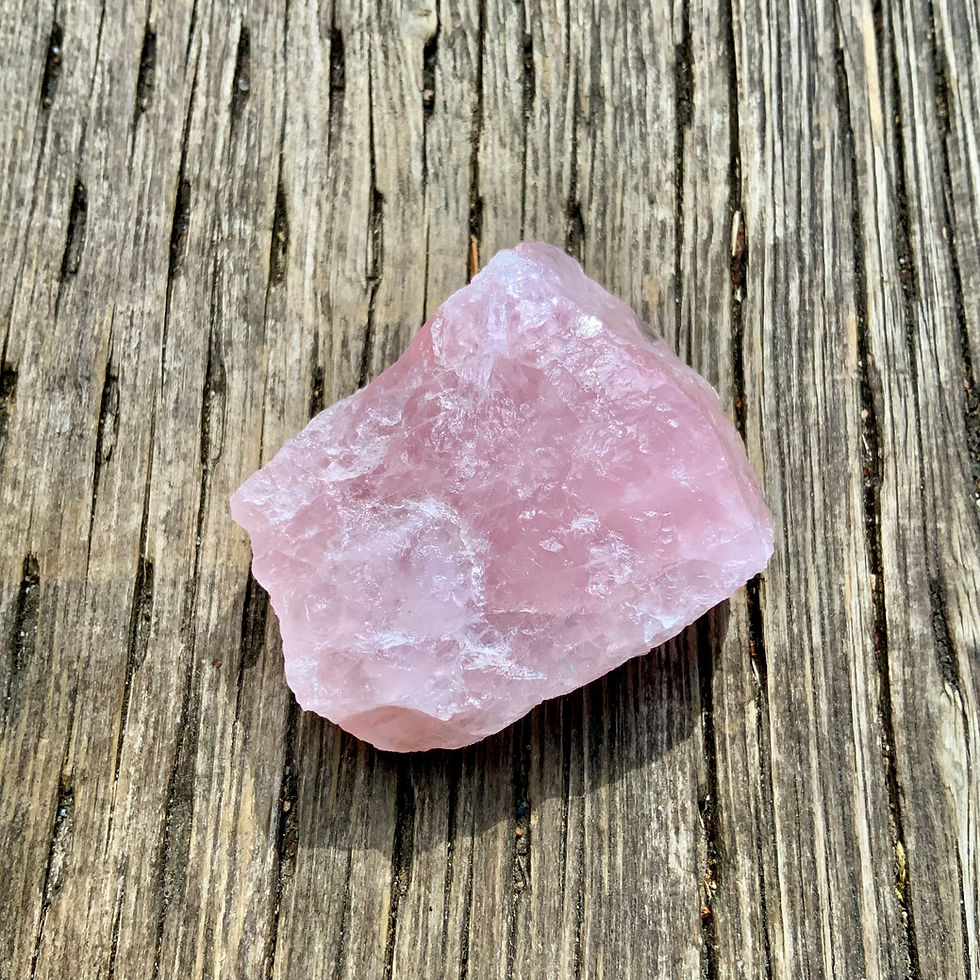 Raw rose quartz rough crystals at metaphysical crystal shop Canada