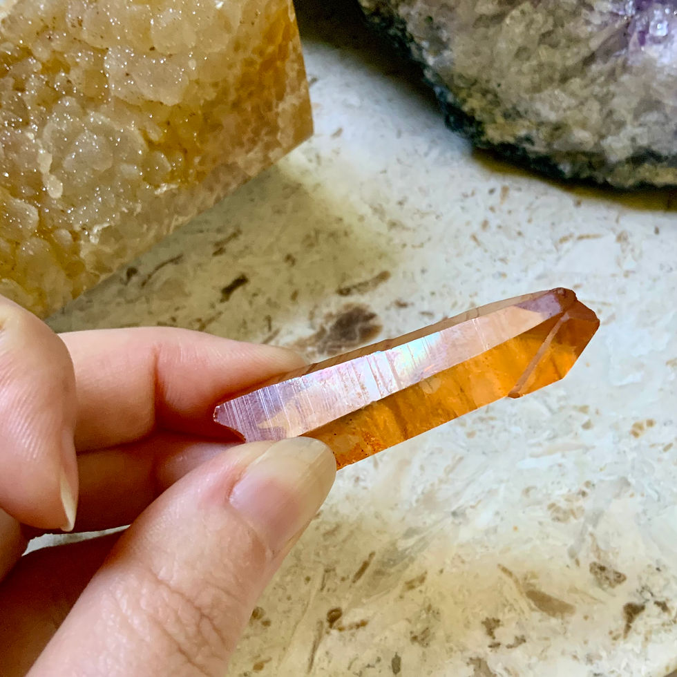 Tangerine lemurian Quartz crystal at Metaphysical crystal shop