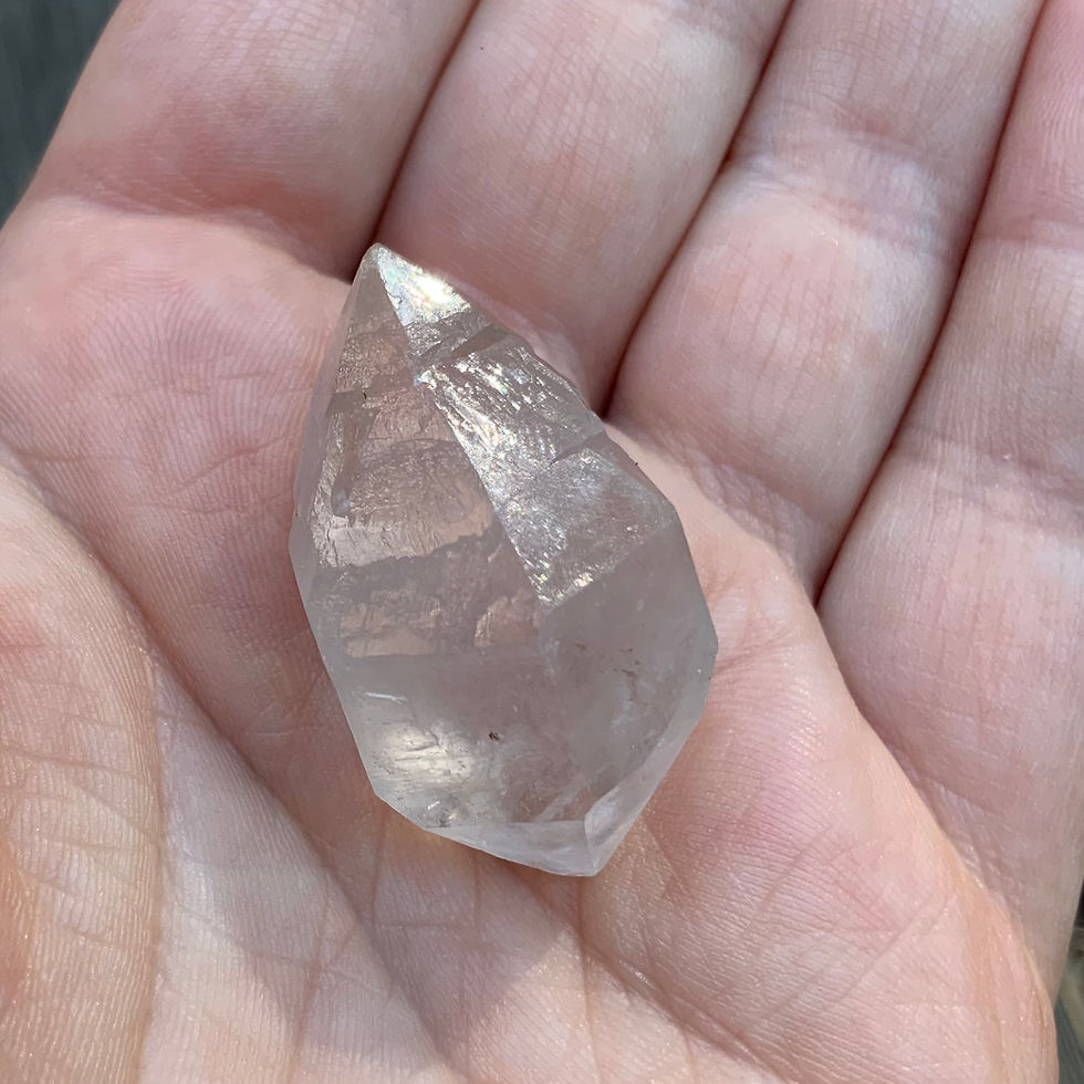 Double terminated Quartz crystal point at metaphysical crystal shop Canada