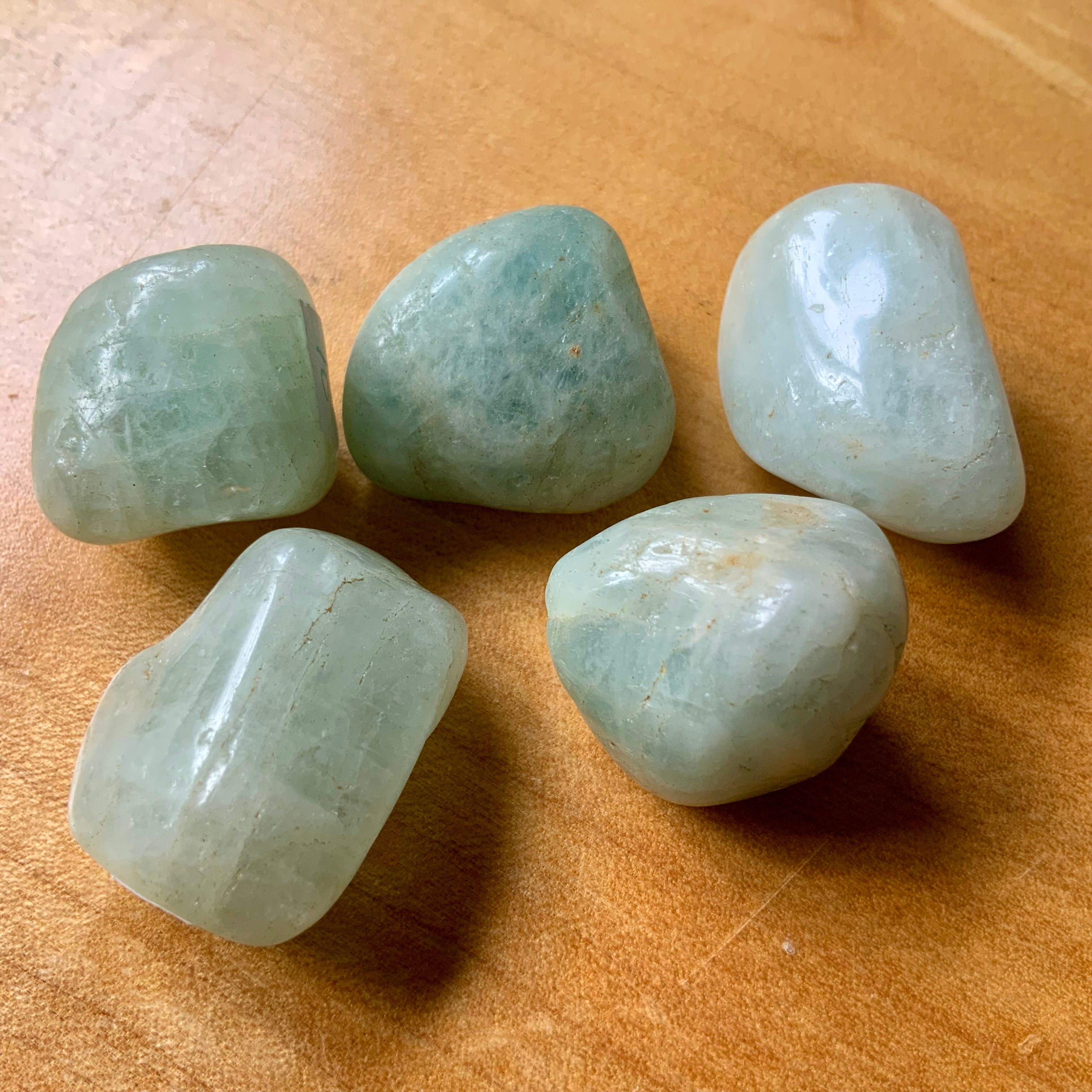 Aquamarine tumbled crystals at metaphysical crystal shop canada