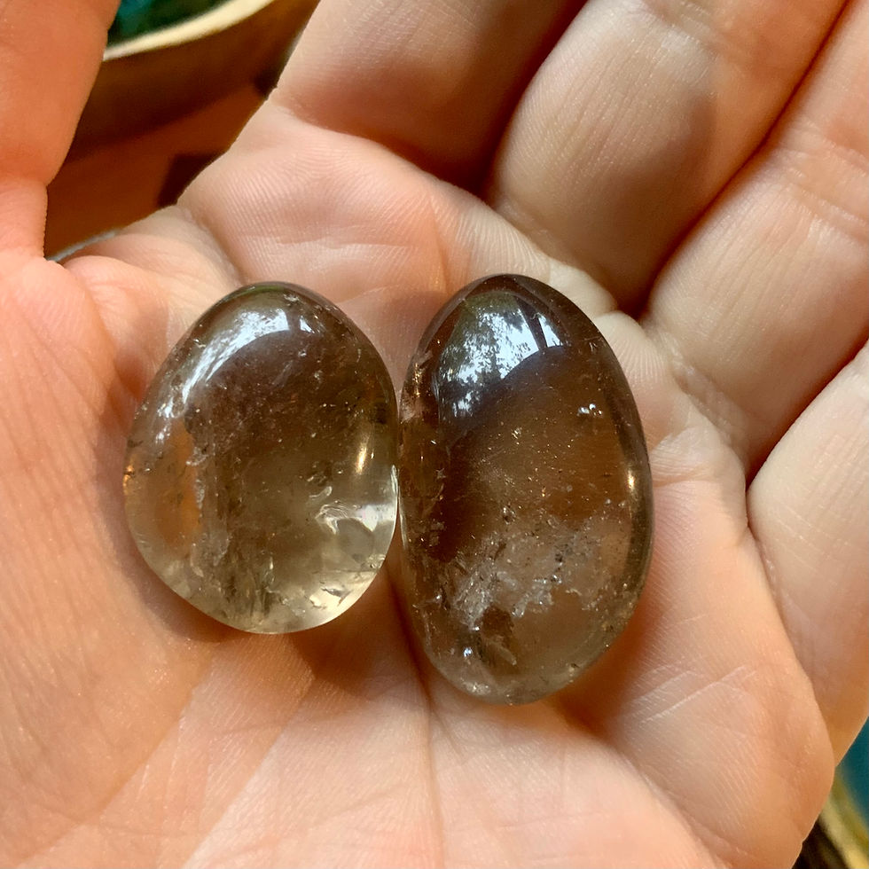 Tumbled smoky Quartz crystals at metaphysical crystal shop