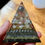 Thumbnail: 2.5 inch tall Orgonite Pyramid Hematite Moonstone orgone generator at metaphysical crystal shop canada
