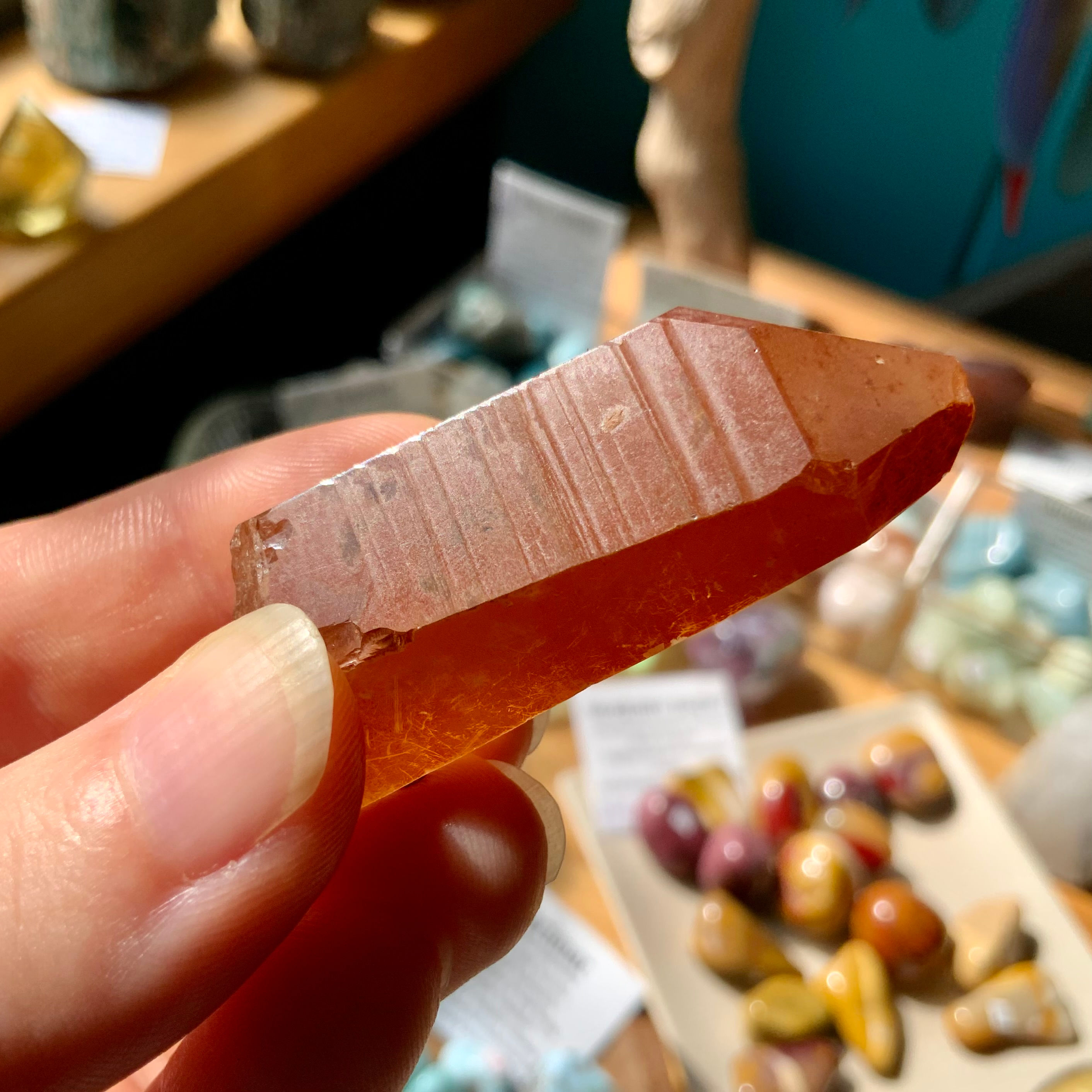 Tangerine lemurian Quartz point at metaphysical crystal shop Canada