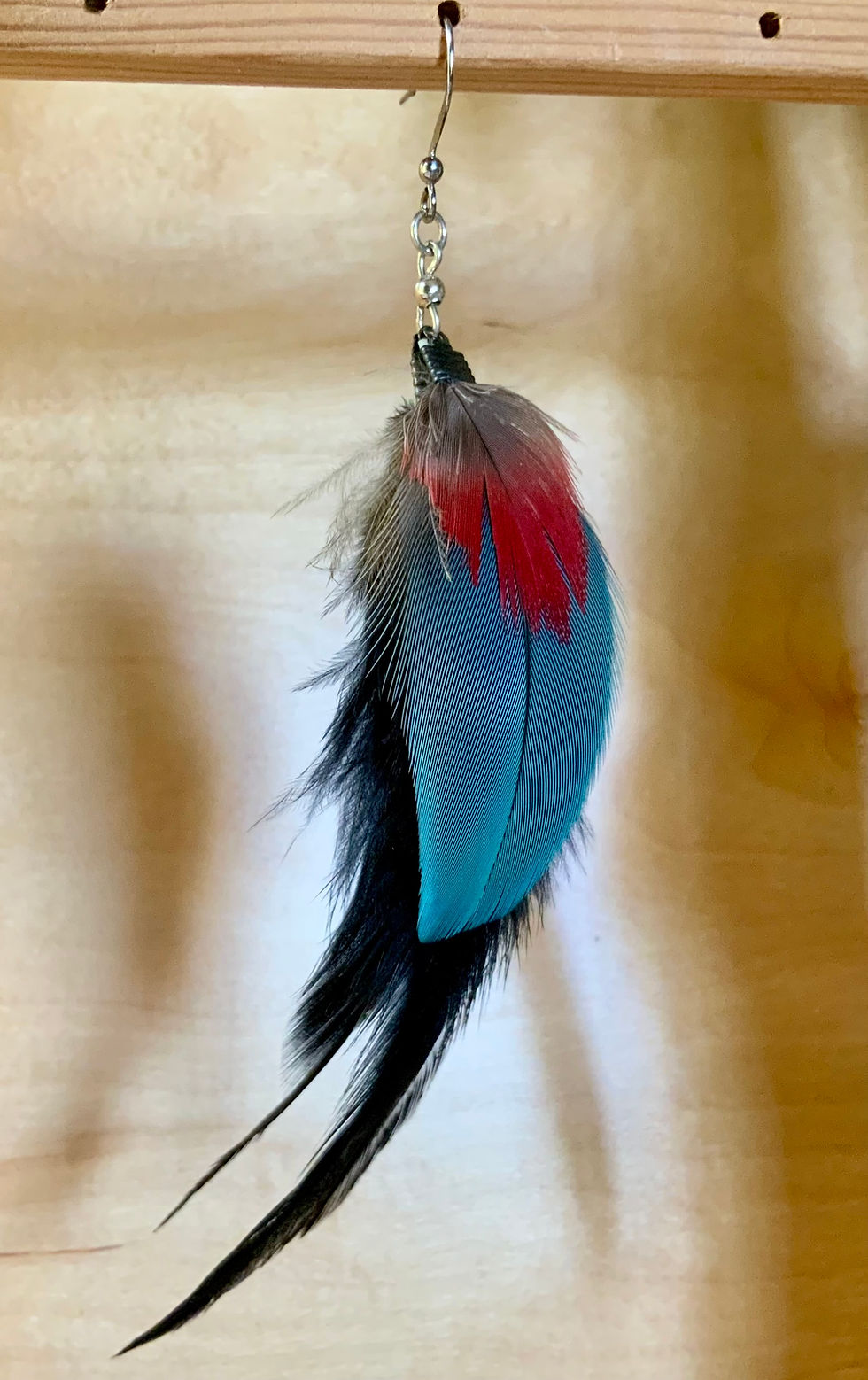 Parrot and rooster feather earring single at metaphysical crystal shop Canada