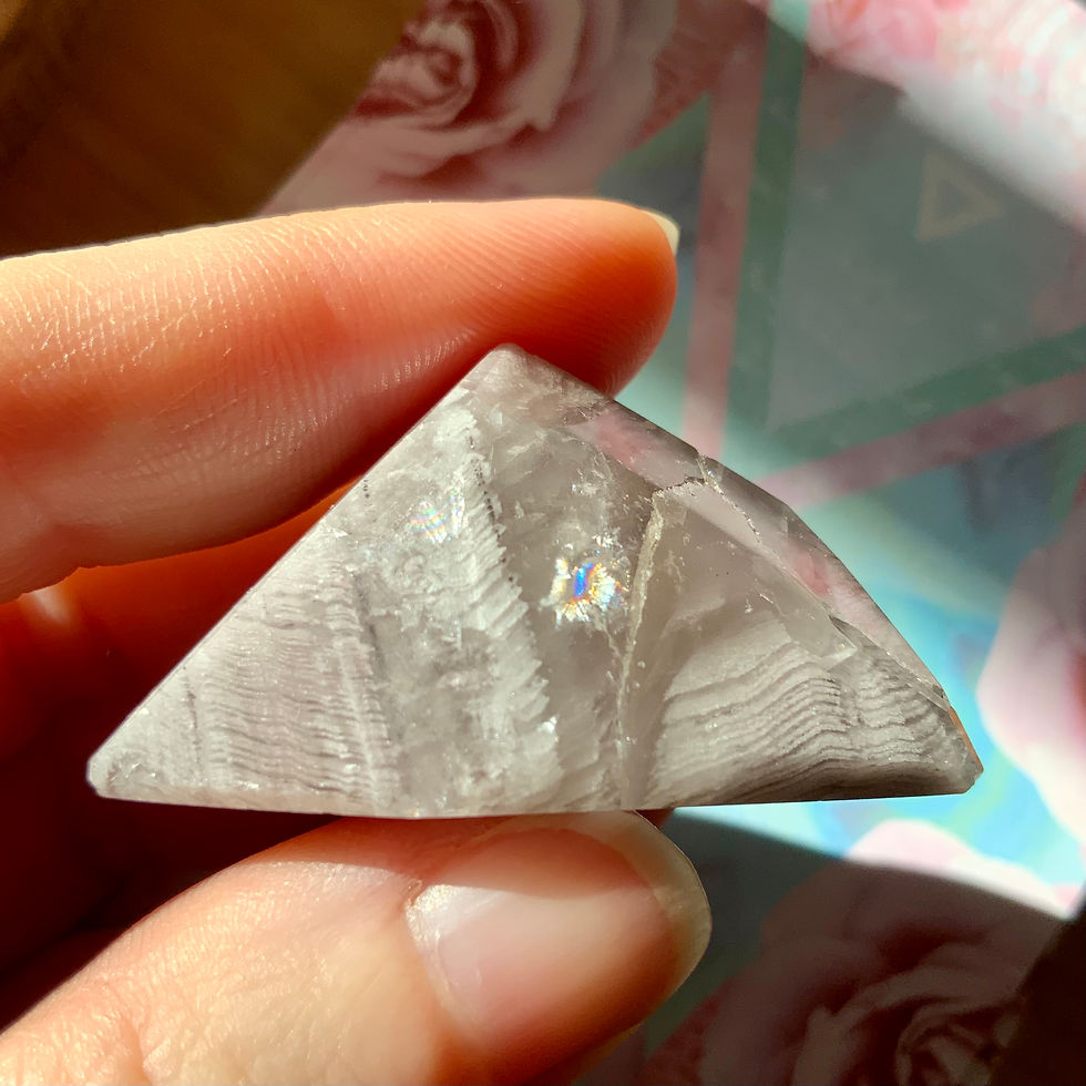 Lithium Quartz freeform carved at metaphysical crystal shop Canada