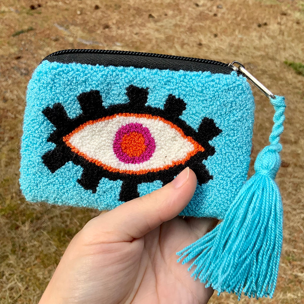 Tapestry evil eye coin purse indigenous made by Wayuu of northern Colombia at metaphysical crystal shop