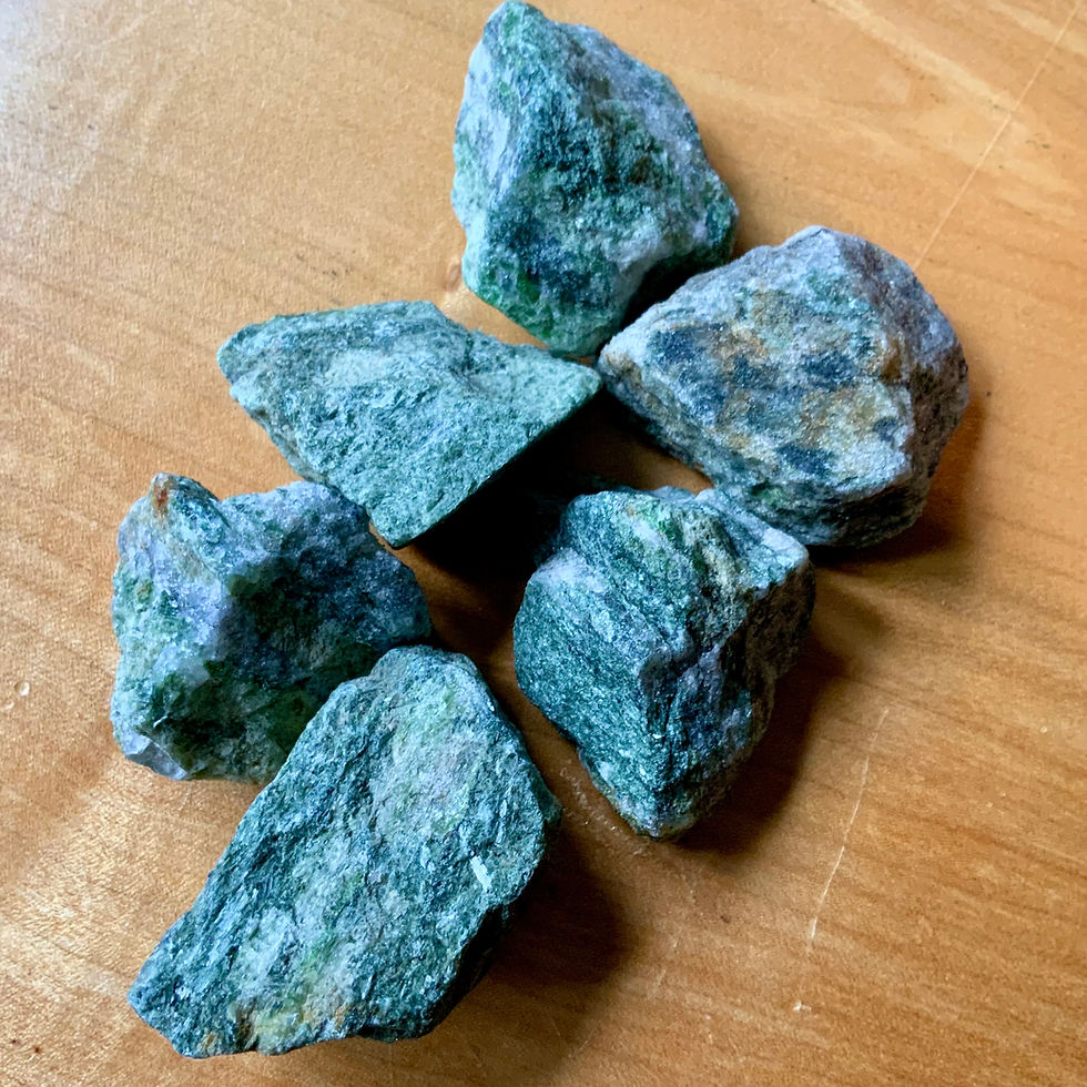 Rough diopside crystals at metaphysical crystal shop