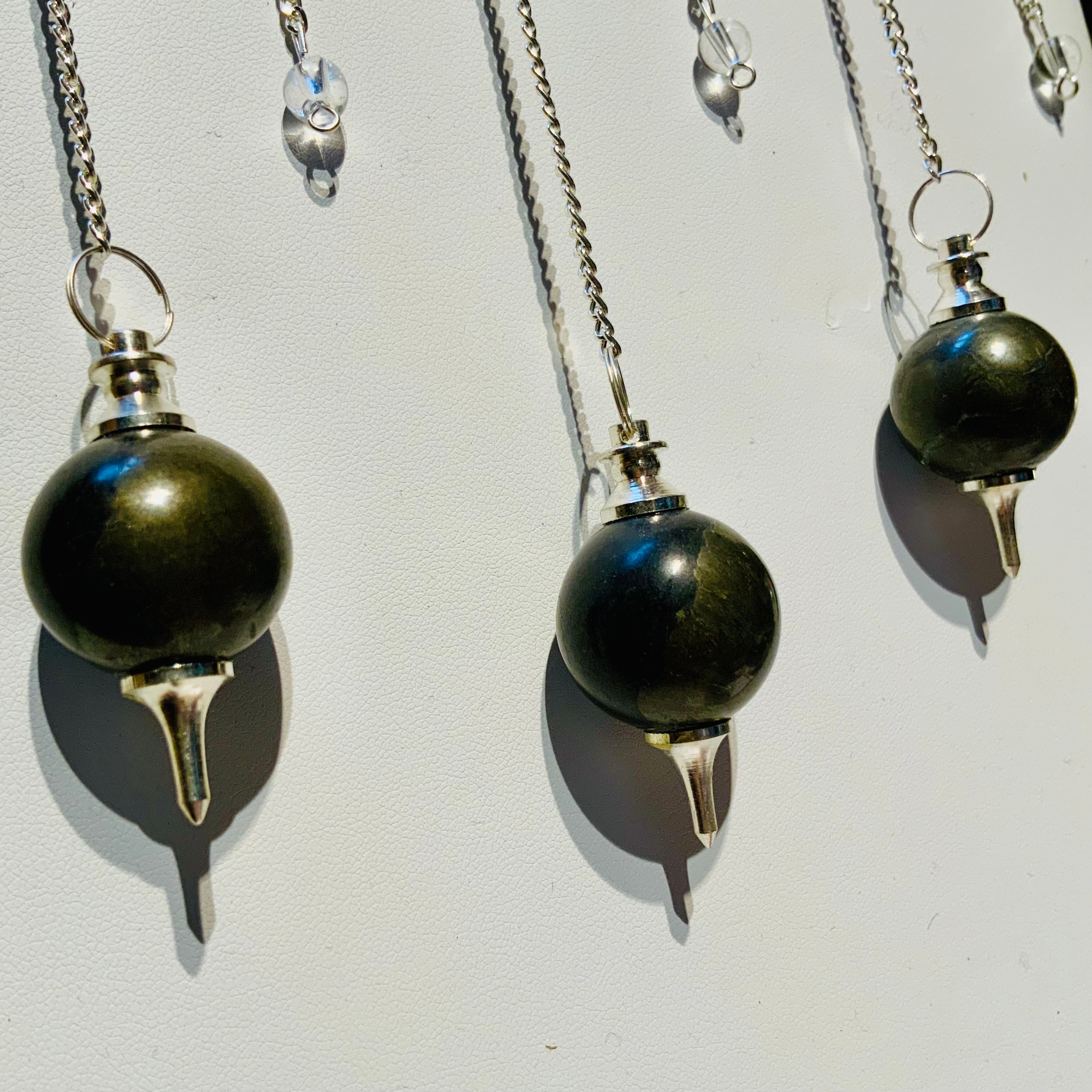 Pyrite pendulum at metaphysical crystal shop Canada