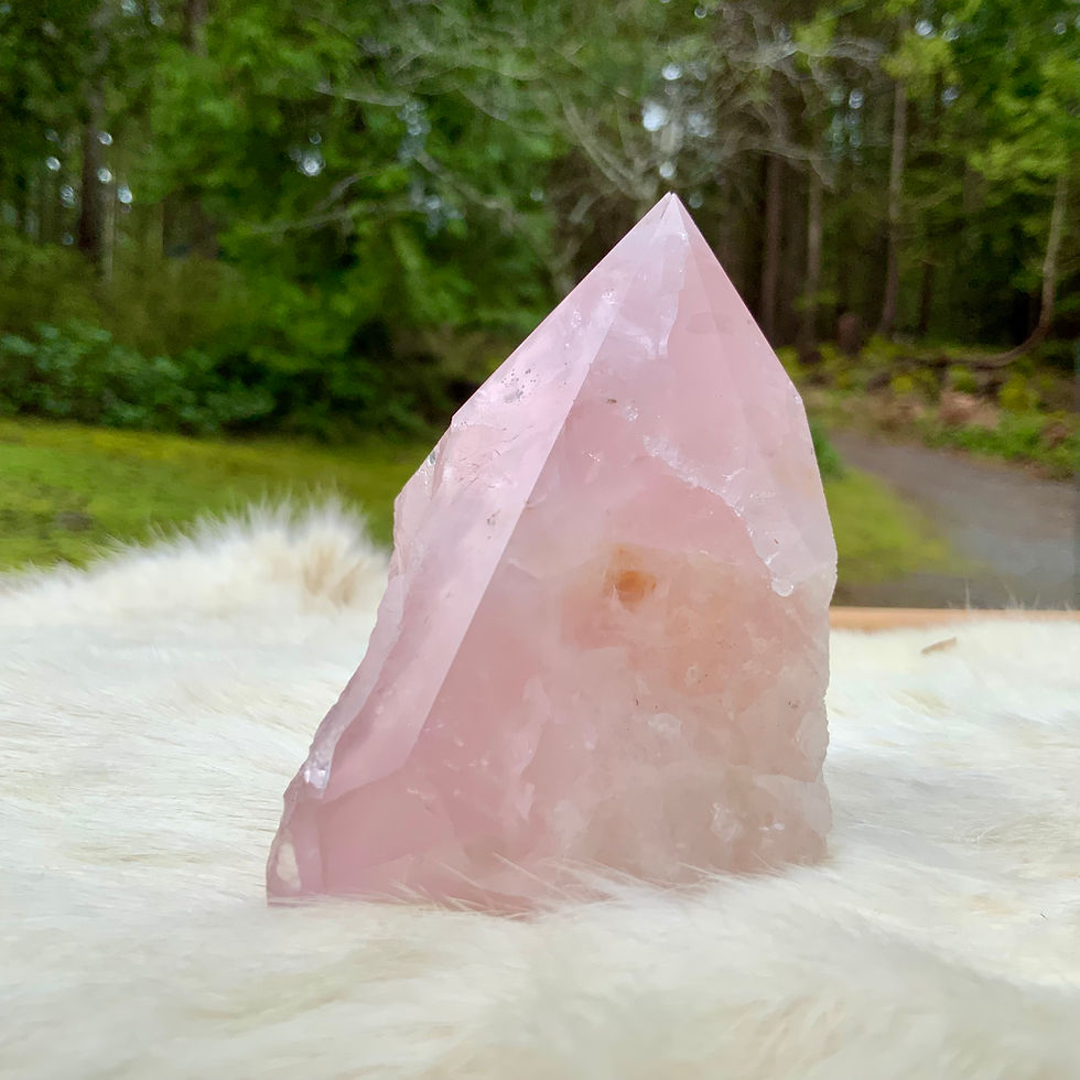Thumbnail: Rose Quartz carved point at metaphysical crystal shop Canada
