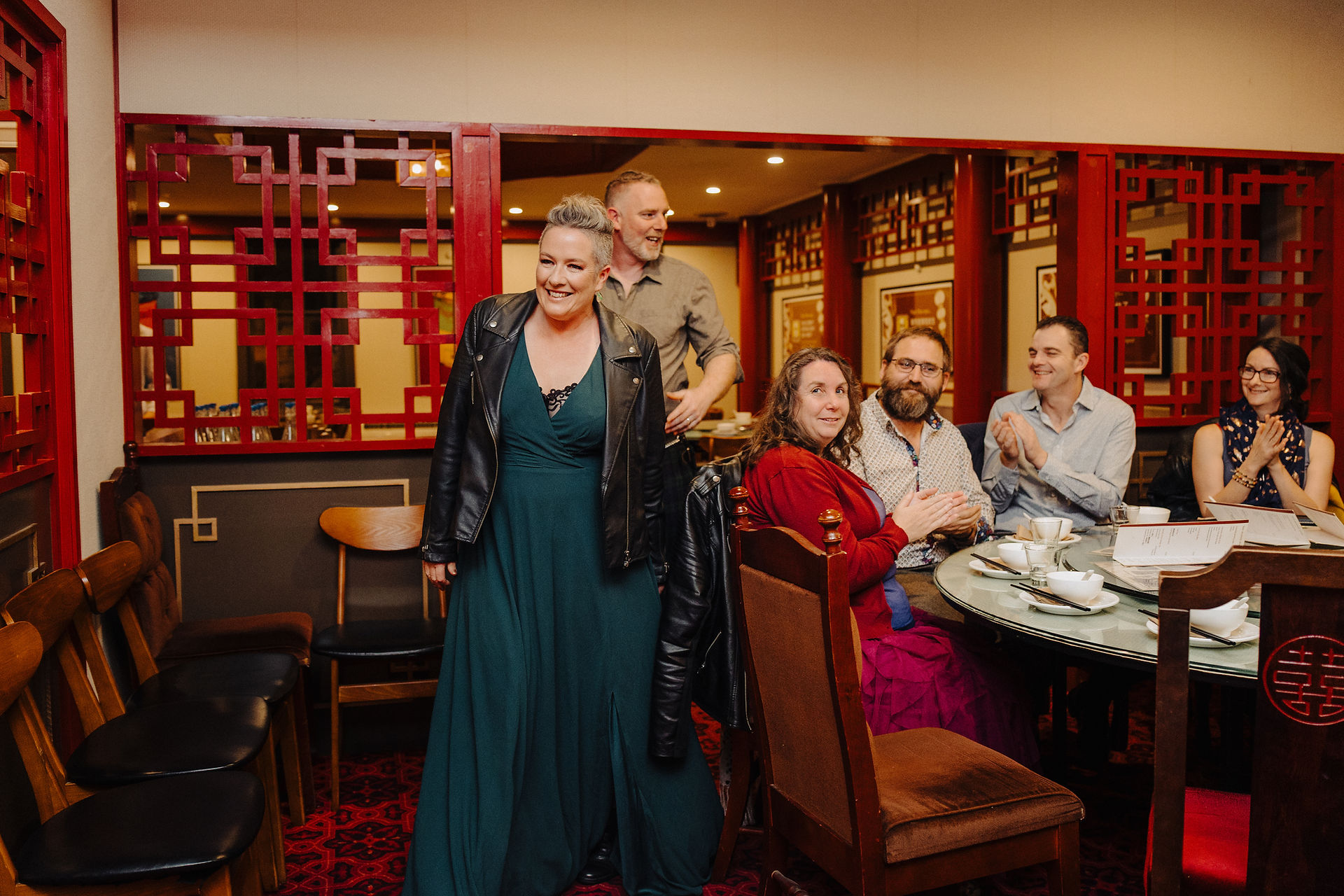 Couple entering dinner at Chinese Restaurant, meeting friends after vow renewal ceremony, Dunedin New Zealand