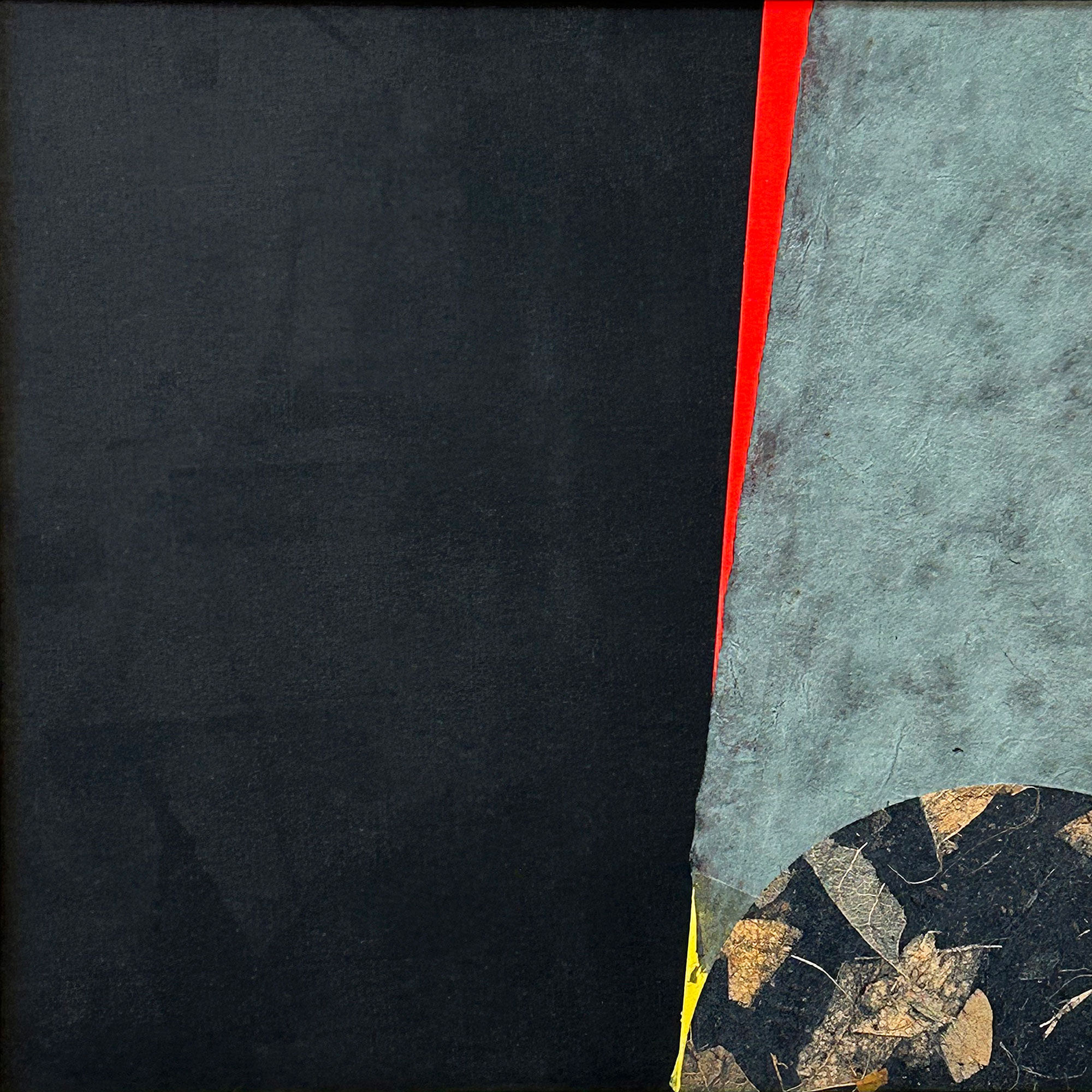 Collage with bright red slicing through solid black to its left and cool greys on its right.