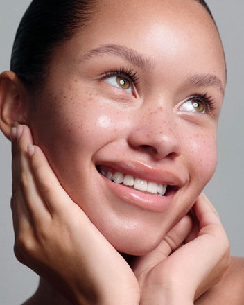 Natural beauty makeup on freckled skin for advertising campaign