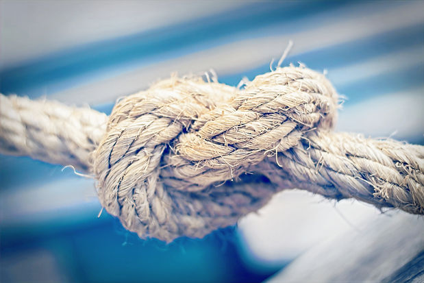 Close-up of intertwined rope forming a knot