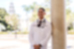 Photo of a recent doctoral graduate. Carl provide graduation photos in Maple Valley, WA and in the greater Seattle area