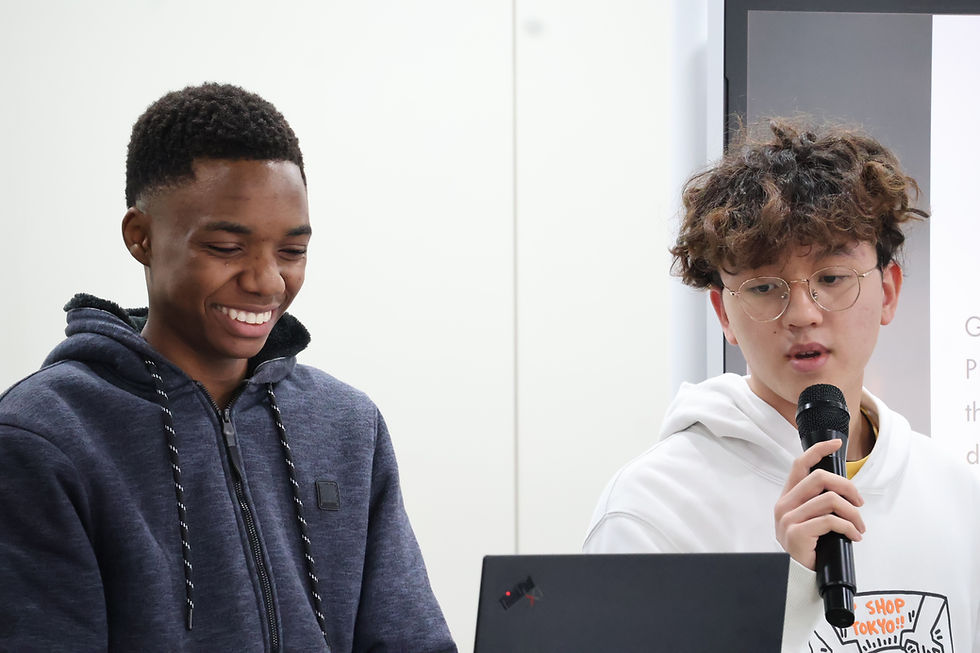 Two students presenting to the group