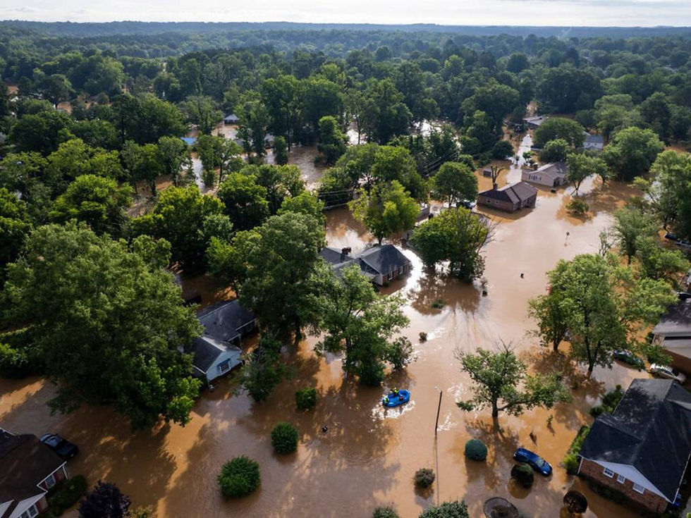 An aerial view of Durham shows widespread flooding on July 6. Heavy rain brought even more flooding later the same week.