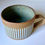 Thumbnail:   Stoneware mug in cornflower slip