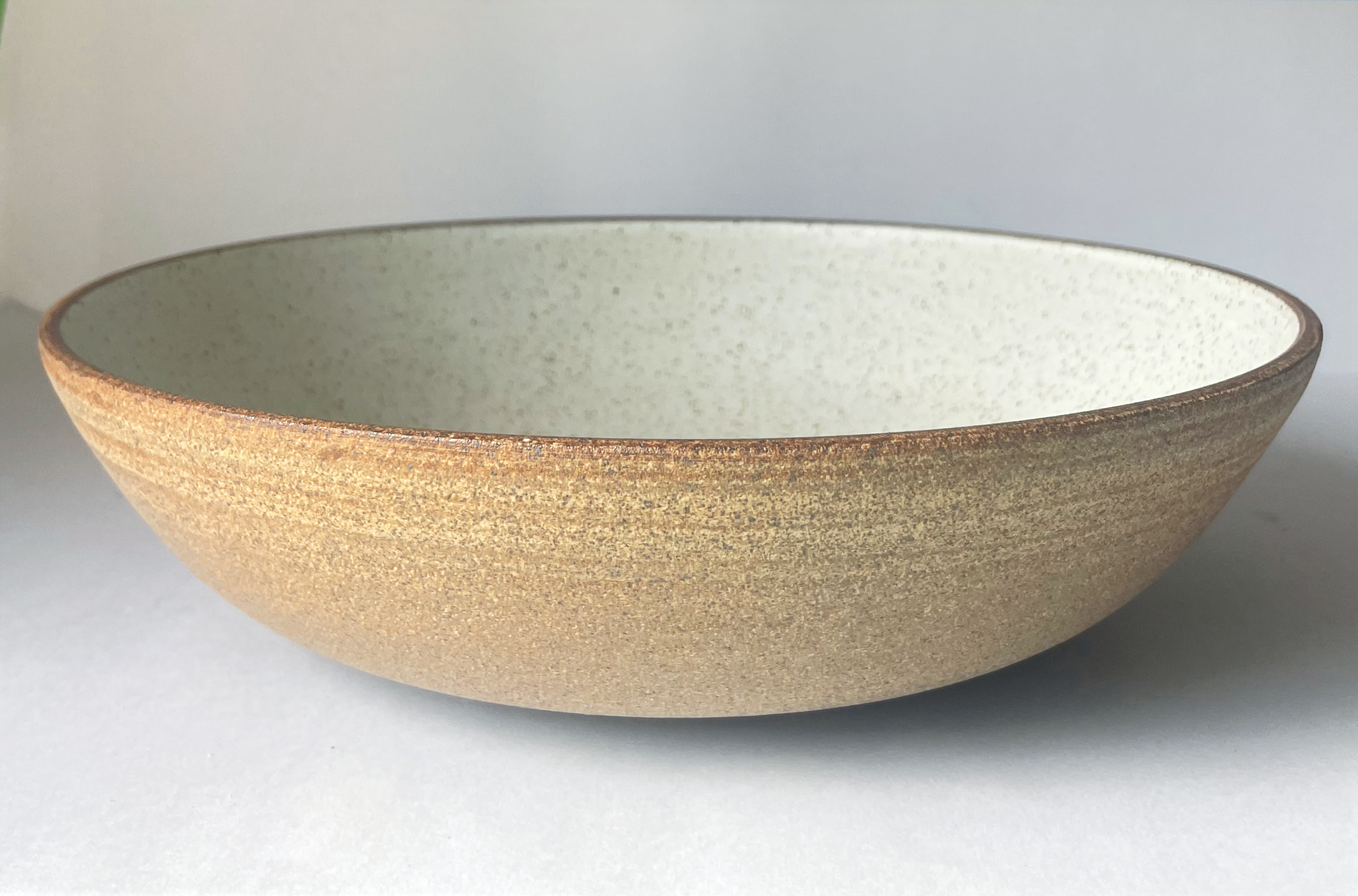 Stoneware bowl in speckled white glaze
