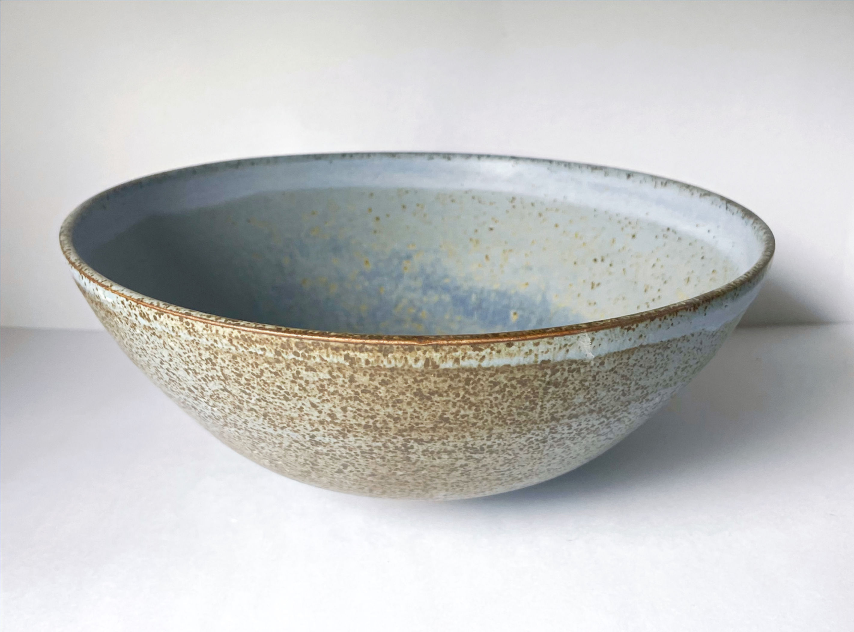Stoneware bowl in cornflower blue glaze