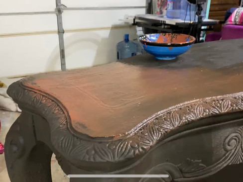 painting rusty nail over coffee bean