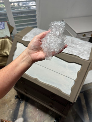 a balled up piece of saran wrap to apply rice paper by Traceys Fancy