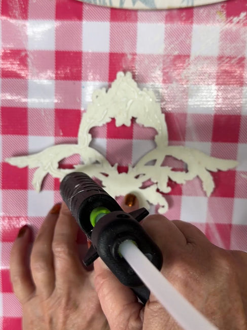 applying glue to mold for rolling pin recipe holder by Traceys Fancy