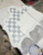 painting gray checks on thrifted fireplace screen by Traceys Fancy