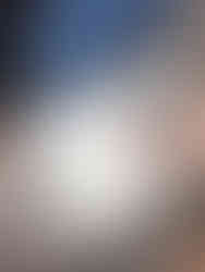 gently misting decoupage paper with water before applying to writing desk