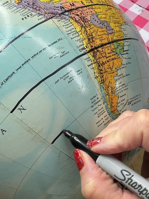 drawing lines on thrift store globe