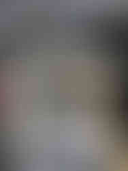 partially painted thrifted side table with white paint