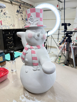 pink stripes and checks on snowman centerpiece