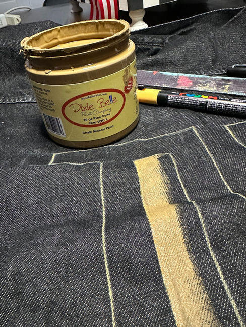 painting pine cone chalk mineral paint on men's custom painted denim jacket