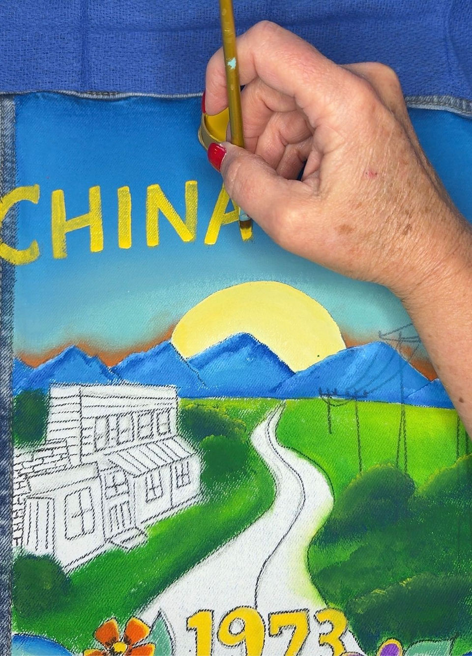 multi colored sky on custom painted denim jacket by Traceys Fancy