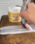 starting to paint a copy of bonding boss by Dixie Belle on the top of a furniture piece