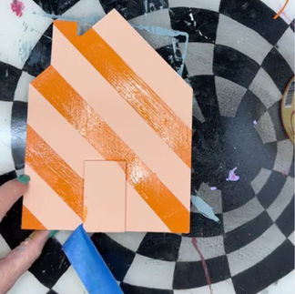 painting diagonal stripes on hand painted miniature village
