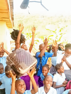 BAGS IN THE AIR CELEBRATING END OF TERM