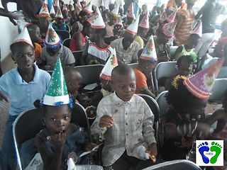 Ebolas-orphans-enjoying-their-christmas-party-food-2.JPG