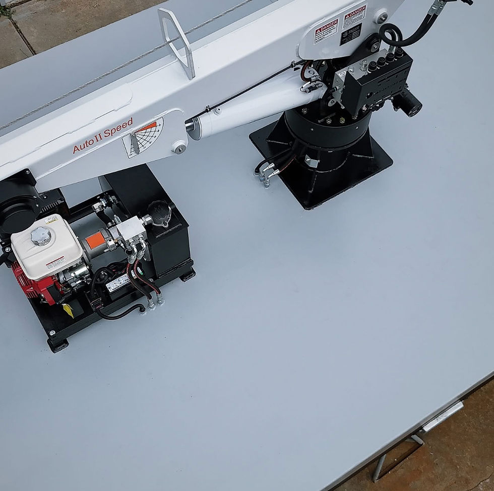 Hydraulic crane and engine for a steel workboat builder.