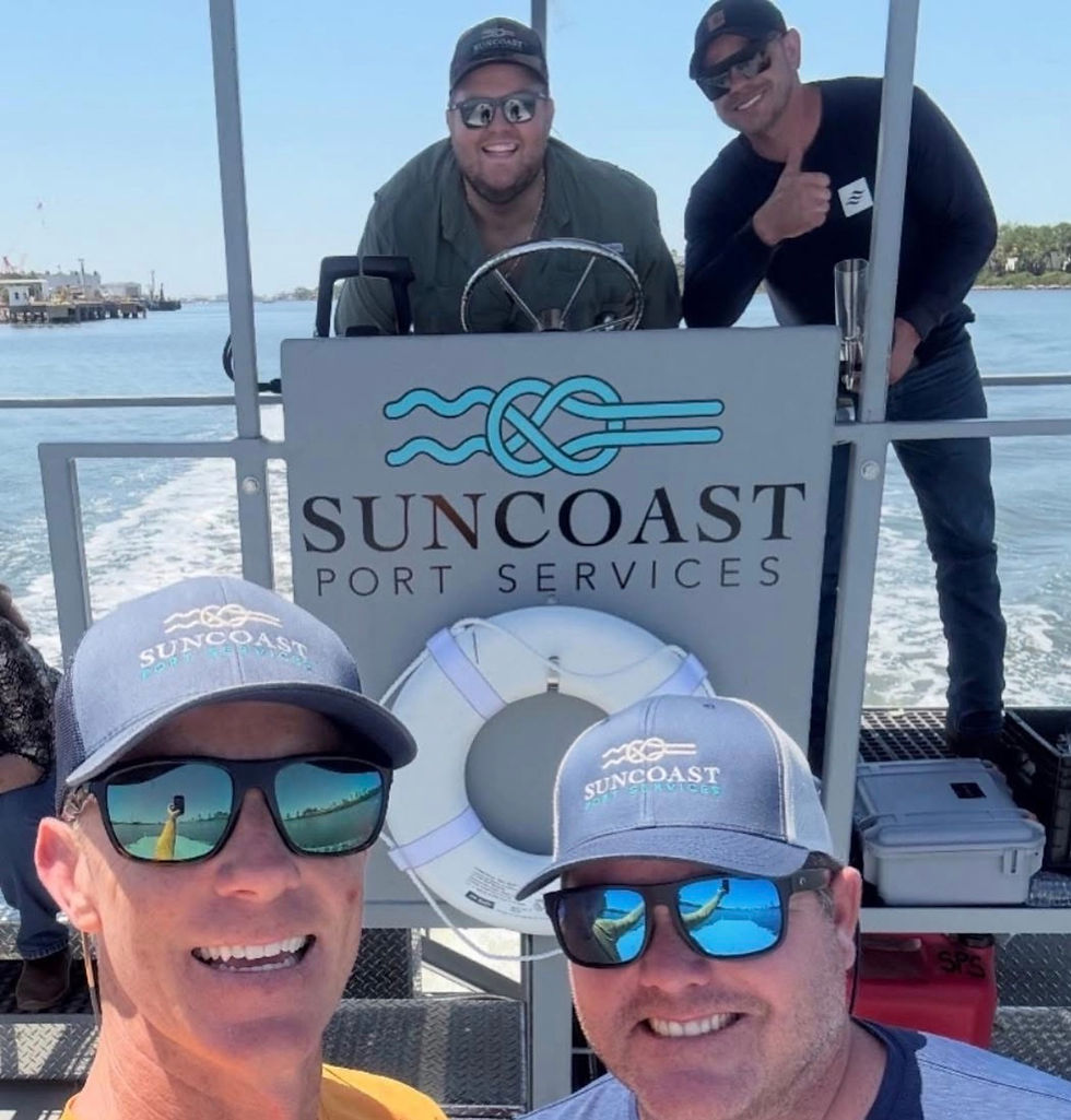 The Suncoast Port Services team on a steel workboat.