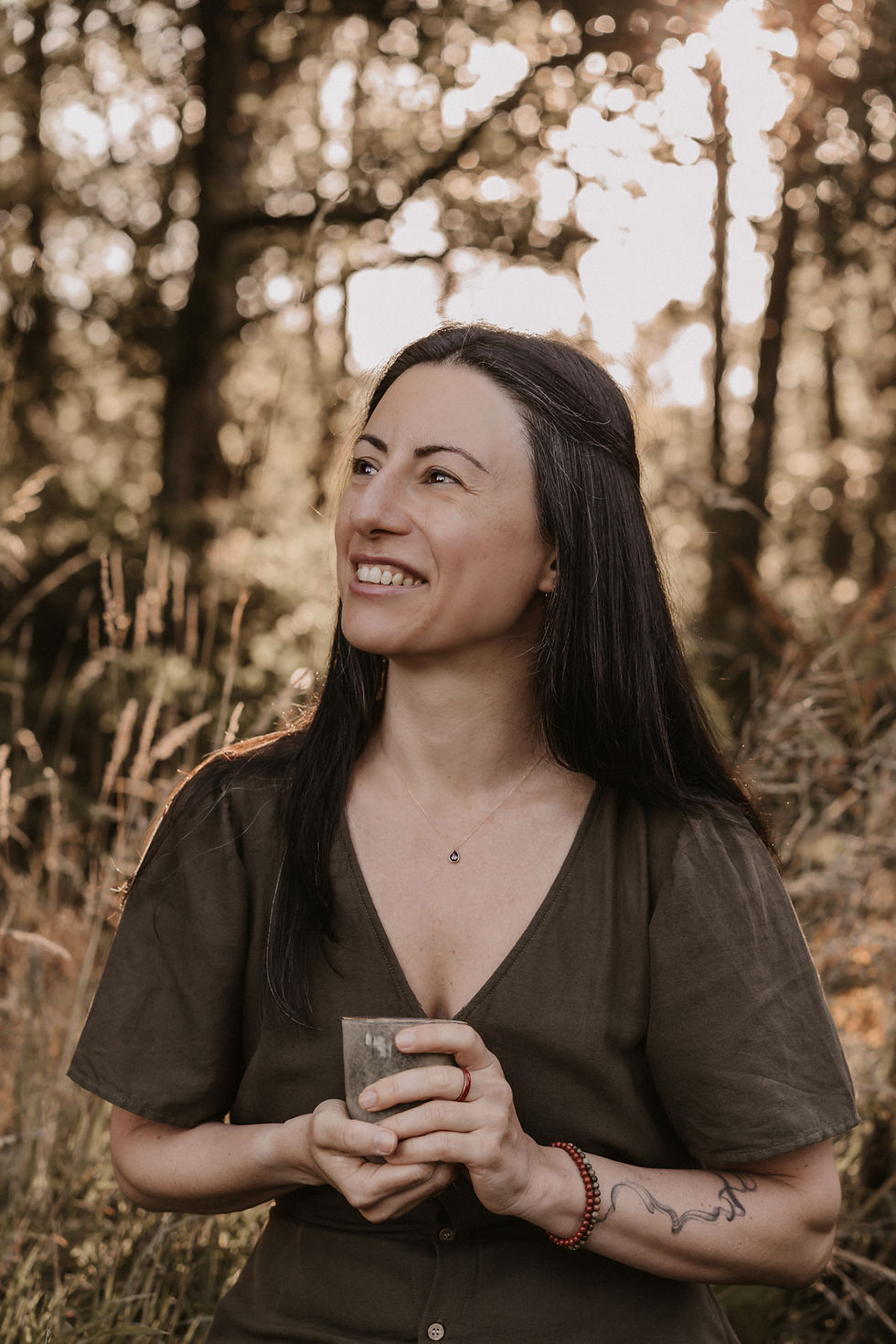 Somatic practitioner connecting with nature, reflecting the gentle approach of Gradiva Space.