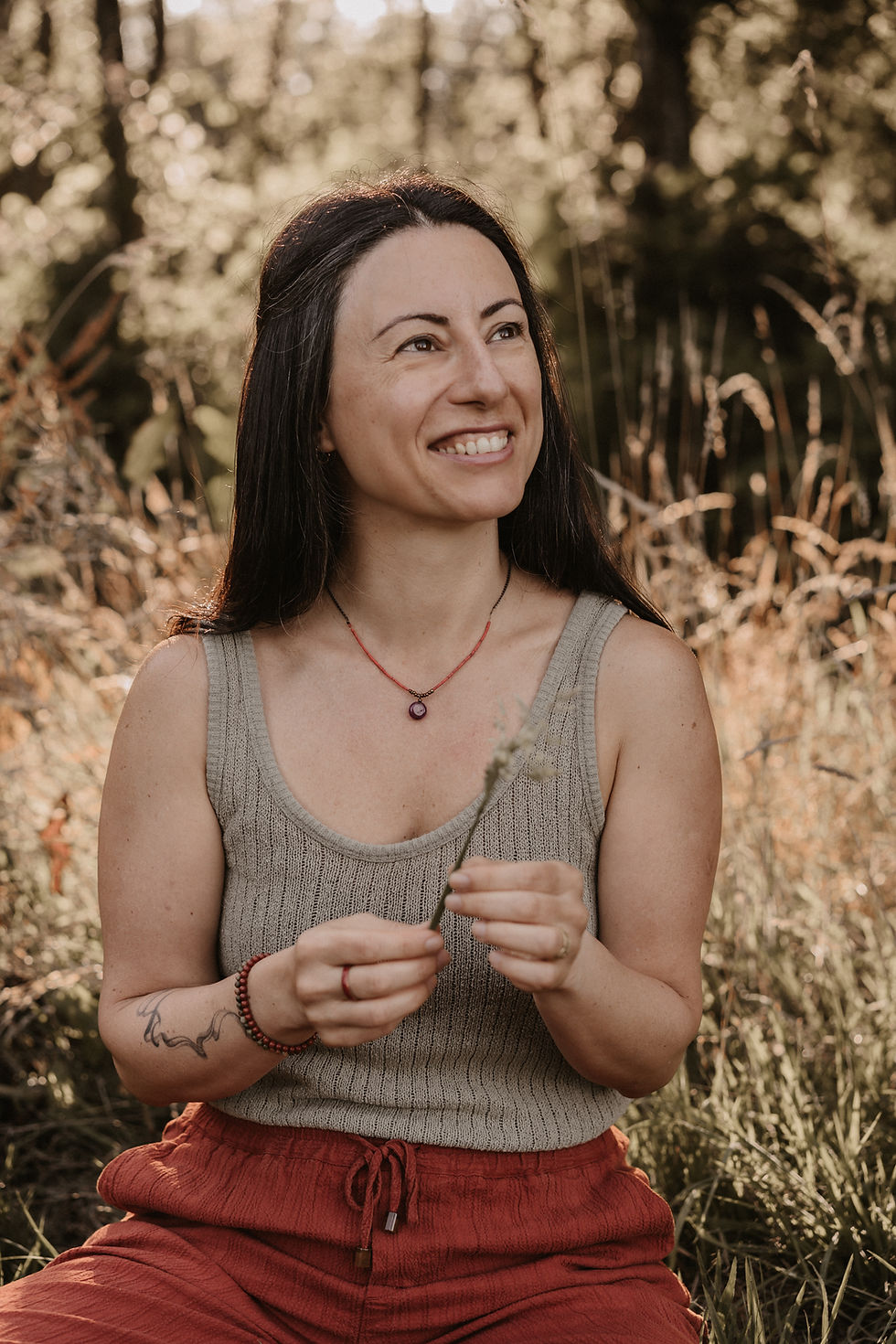 Somatic practitioner connecting with nature, reflecting the gentle approach of Gradiva Space.
