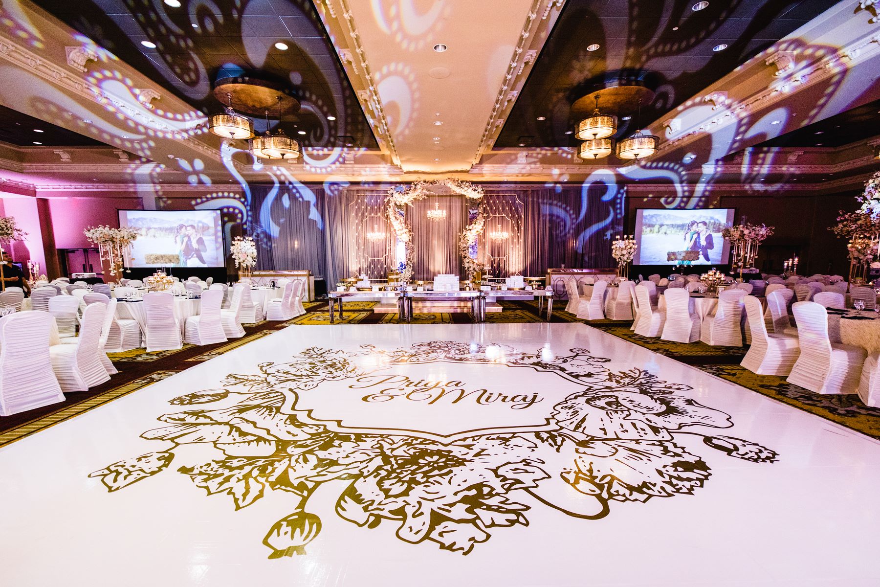 Upscale Houston wedding venue interior with elegant table settings and ambient lighting