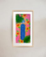 St Pete Welcomes You print in a natural wood frame with 1 inch white matting