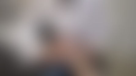 physician consulting with a patient, reading pulse