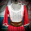 Thumbnail: Red Prairie Dress With Ruffled White Eyelet Bodice